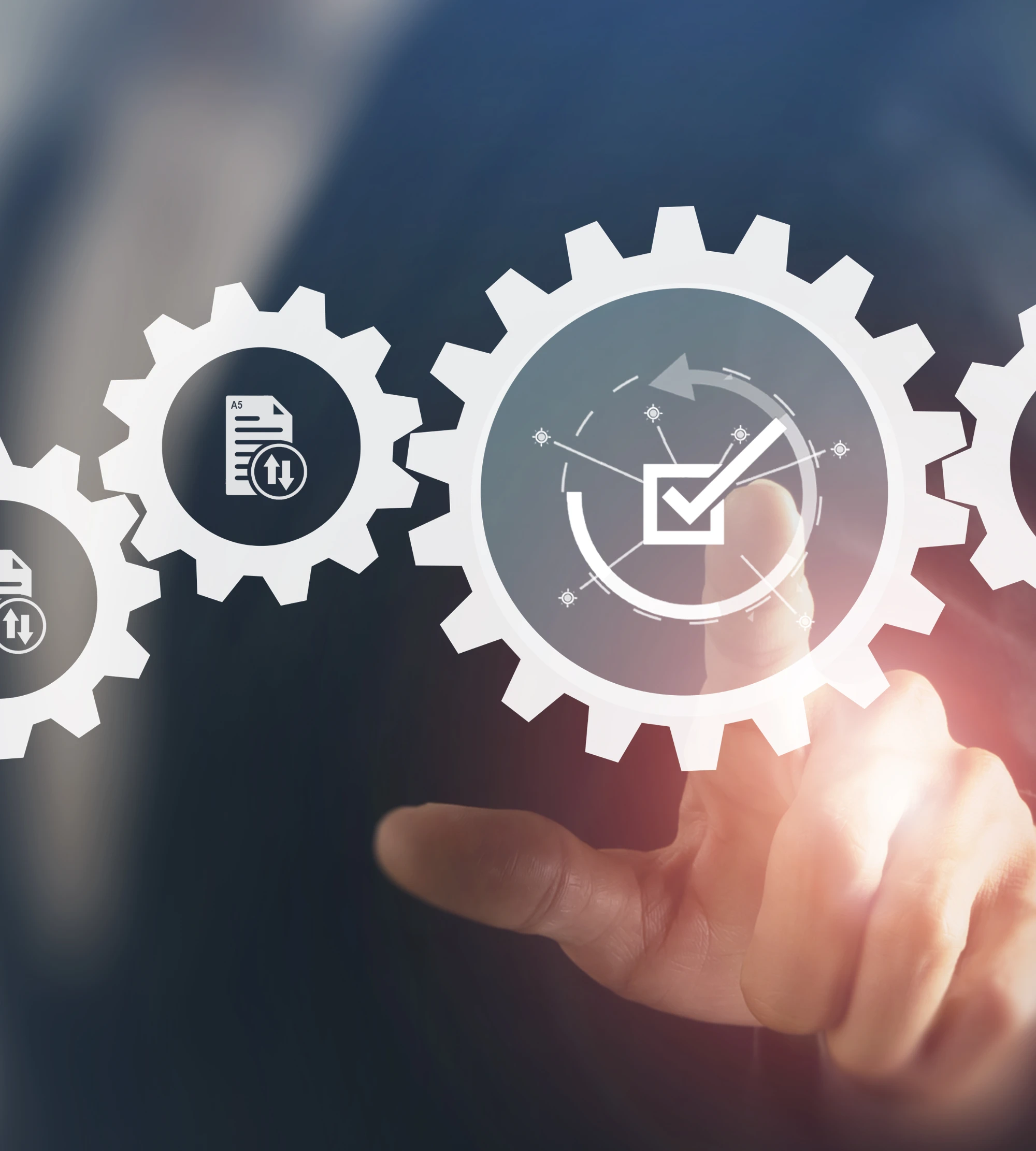 Das Bild zeigt mehrere Zahnräder, die die unterschiedlichen Leistungen von Härtel Consutling darstellen